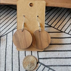 Hand made lightweight wooden earrings .